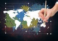 Hand painting a Colorful Map with paint splatters on wall background Royalty Free Stock Photo