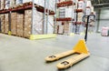 Hand pallet stacker truck at warehouse