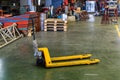 Hand pallet truck jack in factory warehouse. Hydraulic hand pallet jacks. Pallet truck with empty Royalty Free Stock Photo