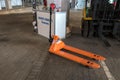 A hand pallet truck at a warehouse equipment exhibition Royalty Free Stock Photo