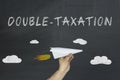 Double taxation holding concept Royalty Free Stock Photo