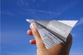 Hand with paper plane for success, business, news, solution or others Royalty Free Stock Photo