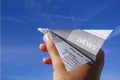 Hand with paper plane for success, business, news, solution or others Royalty Free Stock Photo