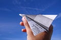 Hand with paper plane for success, business, news, solution or others Royalty Free Stock Photo