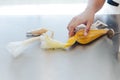 Hand on pastry bags with colored cream inside for making decorated flower for cake