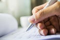 Hand with pen over application form Royalty Free Stock Photo