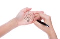 Hand with pen write idea light bulb