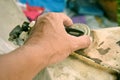 Hand of people are opening to oil cover of motorcycle for checking oil remain in tank Royalty Free Stock Photo