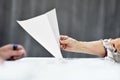Hand of a person casting a vote Royalty Free Stock Photo