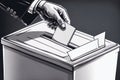 Hand of a person casting a vote into the ballot box during elections. Royalty Free Stock Photo