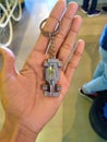 Hand of a person showing Car bijou in jewellery shop.