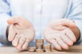 Hand of a person who is giving a loan to prevent and help with family debt problems