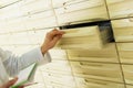 Hand of pharmaceutist opening drawer in farmacy Royalty Free Stock Photo