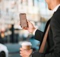 Hand, phone and location with a business man in the city, searching a map on his morning commute for work. Mobile, app Royalty Free Stock Photo