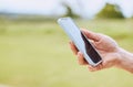 Hand, phone and person use gps online on mobile app to navigate on a field with internet connection for a smartphone Royalty Free Stock Photo