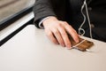 Hand and Phone in transit Royalty Free Stock Photo