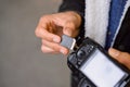 Hand of photographer holding SD memory Card Royalty Free Stock Photo