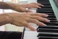 Piano Player Hand on Electric Piano in Zoom View Royalty Free Stock Photo