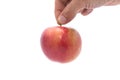 Hand picking an apple Royalty Free Stock Photo