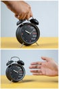 Hand picking up a clock
