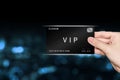 Hand picking VIP or very important person platinum card