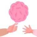 Hand with pink candy floss with on white background. Hand giving the cotton candy to child hand