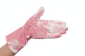 Hand in pink rubber glove