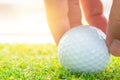 Golf ball on golf course green for business startup