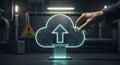 A human hand interactively placing a glowing digital cloud upload icon, symbolizing data storage and transfer. Royalty Free Stock Photo