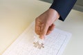 hand and jigsaw puzzle Royalty Free Stock Photo