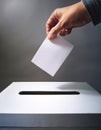 A hand placing a blank ballot into a voting box. Generative AI