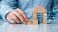 Hand placing wooden block showcasing digital data storage and cloud security concept Royalty Free Stock Photo