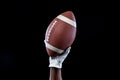 Hand of a player holding American football Royalty Free Stock Photo
