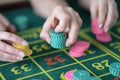 hand of the player making the bet in a casino Royalty Free Stock Photo