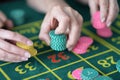 hand of the player making the bet in a casino Royalty Free Stock Photo