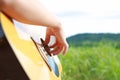 Hand playing on acoustic guitar in the nature Royalty Free Stock Photo