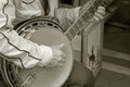 Hand playing banjo guitar monotone color