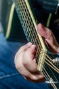 Hand playing guitar chord Royalty Free Stock Photo