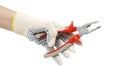 Hand with pliers Royalty Free Stock Photo