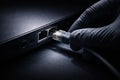 Hand plugging ethernet cable into network port Royalty Free Stock Photo
