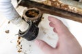 hand of plumber near corrugated drain hose closeup Royalty Free Stock Photo