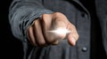 A hand pointing forward emits a bright light, symbolizing focus and direction, AI Royalty Free Stock Photo