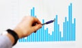 Hand pointing on a graph data Royalty Free Stock Photo