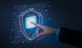 Hand pointing to data security system, Shield protection concept Royalty Free Stock Photo