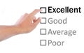 Hand pointing to excellent on quality survey