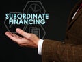 Hand points to the sign Subordinate financing.