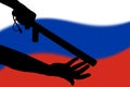 hand with police tonfa rubber stick silhouette and blurry russian flag in the background