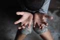 The hand of a poor boy or a beggar. Human Rights. Human trafficking,  poverty or hunger people Royalty Free Stock Photo