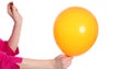 Hand popping an orange balloon with safety pin closeup on white background 4k movie