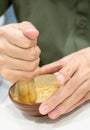 Hand pounding white sesame